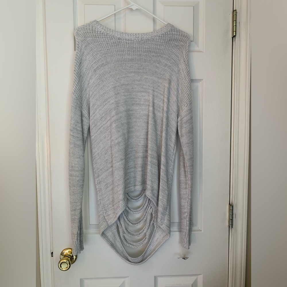 Sweater cotton and viscose. Open back with stripes. Very original and artistic